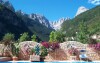Góry za basenem, Alle Dolomiti Boutique Lake Hotel ****, Molveno